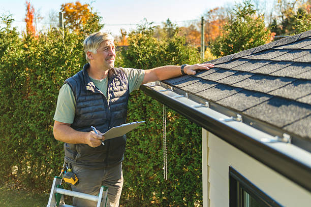 Professional Roof Repair technician working in Holcomb, IL